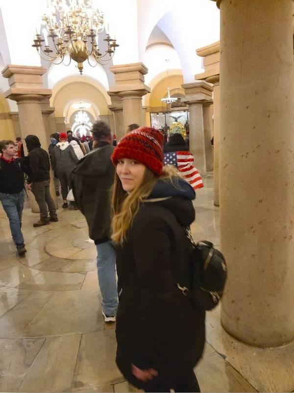 A photo from the FBI shows Agnieszka Chwiesiuk, 29, of Chicago, as she illegally entered the U.S. Capitol with her brother, Karol, a Chicago police officer, on Jan. 6, 2021.
