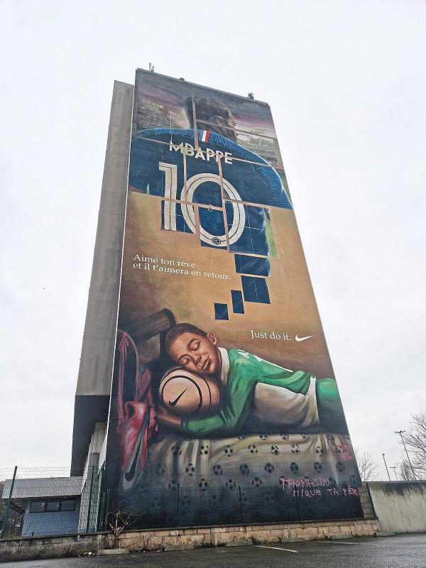 Sports fans may want to head to Bo<em></em>ndy to check out this mural dedicated to footballer Mbappe. — Tripadvisor